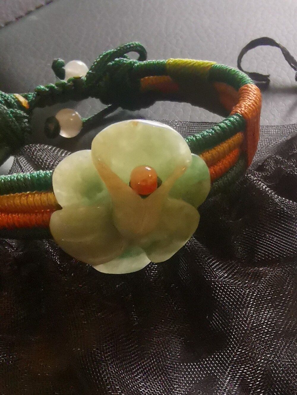 Jade hand-carved floral bracelet, adjustable size, fits everyone.